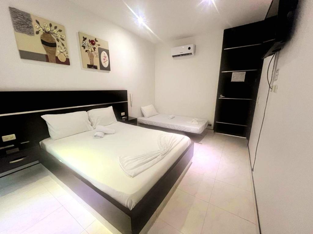 Habitación Triple con cama doble y cama individual